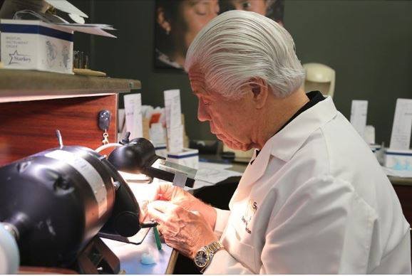 Bill Austin making hearing aid